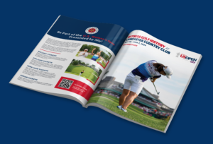 An open magazine displays a U.S. Women’s Open golf event ad, featuring a golfer mid-swing on the right page and event information, photos, and a QR code on the left, all set against a dark blue background.
