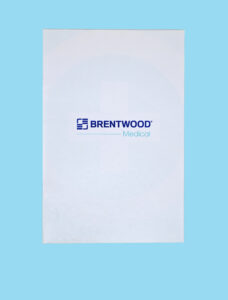 A white sheet with the Brentwood Medical logo in blue and teal, perfect for marketing or advertising, centered on a light blue background.