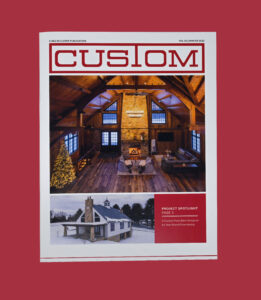 Magazine cover titled CUSTOM featuring a cozy, rustic living room with wooden beams and a stone fireplace above a photo of a snow-covered house; the red background gives it standout appeal perfect for impactful marketing.